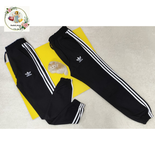 شلوار پسرانه رنگ مشکی بغل نوار دمپاکش جنس بنگال