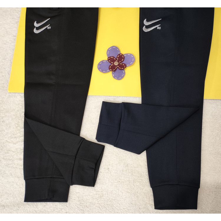 شلوار پسرانه کمرکش دمپا مچ جیب دار جنس غواصی رنگ مشکی