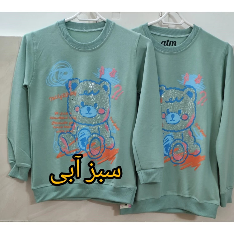 بلوز دخترانه طرح تدی نگین کوب یقه گرد جنس دورس رنگ سبز آبی