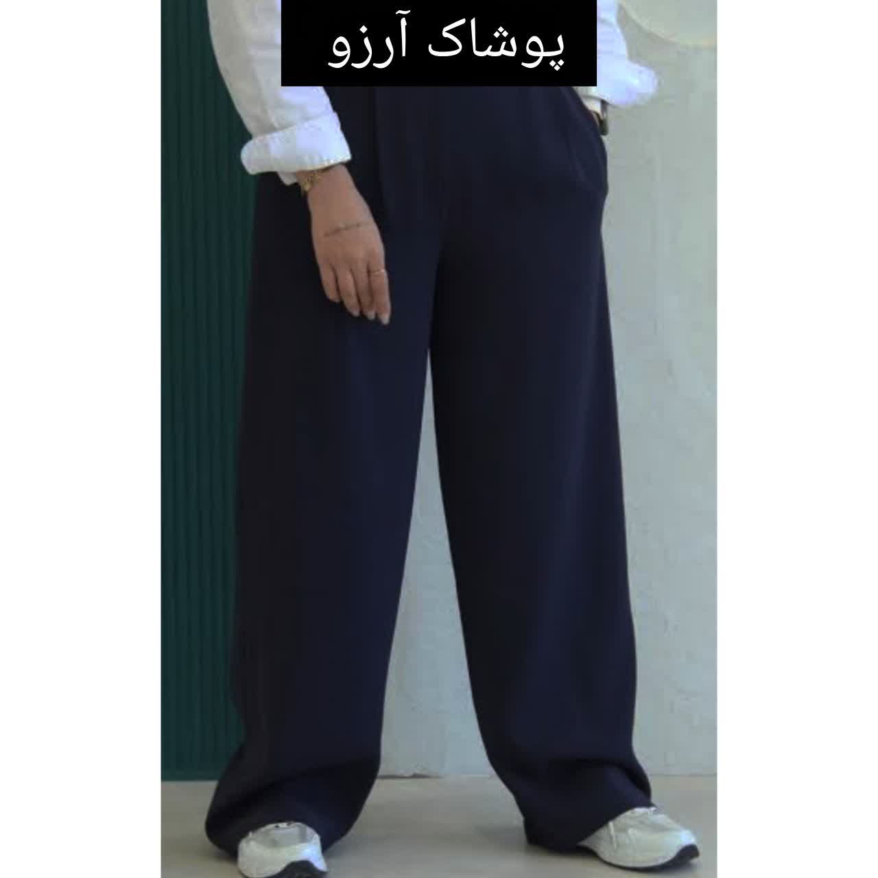 شلوار بگ زنانه جلو بسته کمر کش جنس مورگان ریزشی رنگ سورمه ای تیره