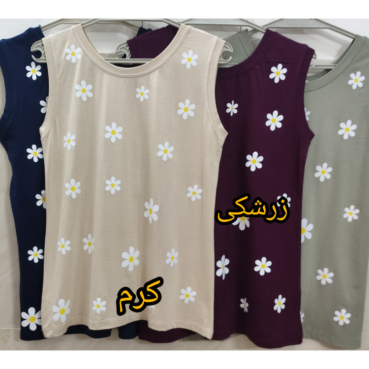 خرید تاپ زنانه آستین حلقه ای یقه گرد جنس نخ پنبه طرح گل بابونه